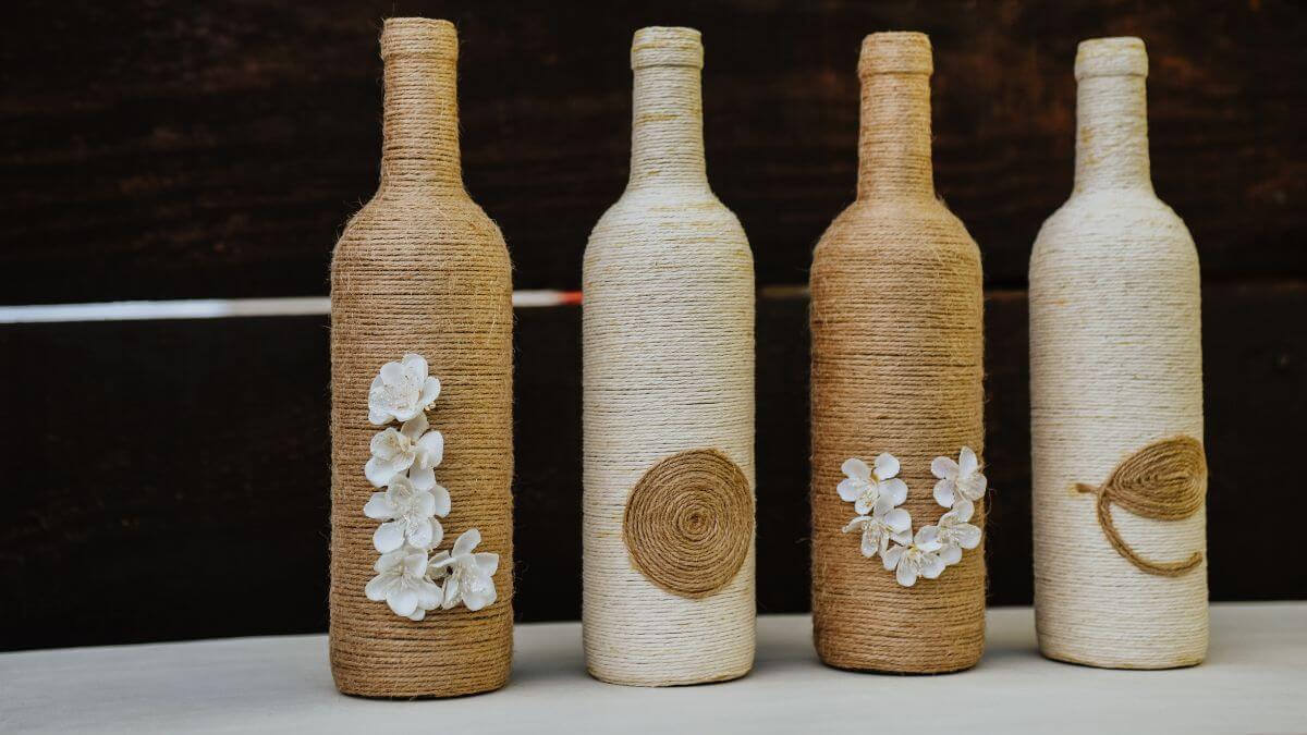 Artesanato com garrafa de vidro e barbante